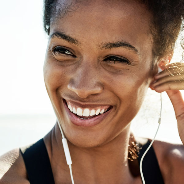 Young woman maintaining oral health with general dental treatment in Wyoming, MI