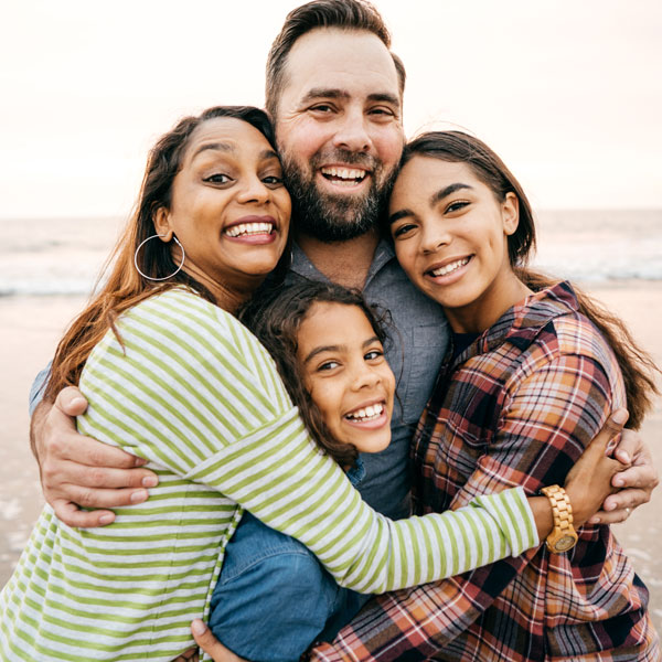 Happy family enjoying family dentistry treatment in Wyoming, MI