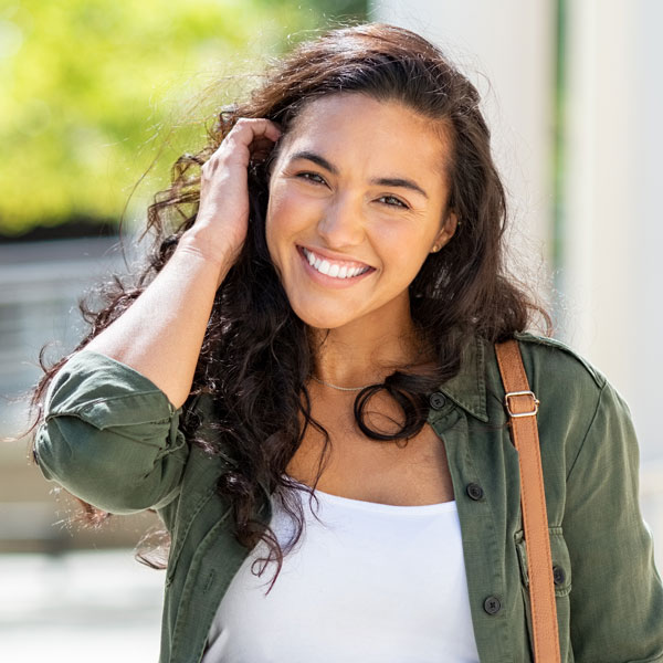 Young woman grateful after receiving emergency dental care in Wyoming, MI