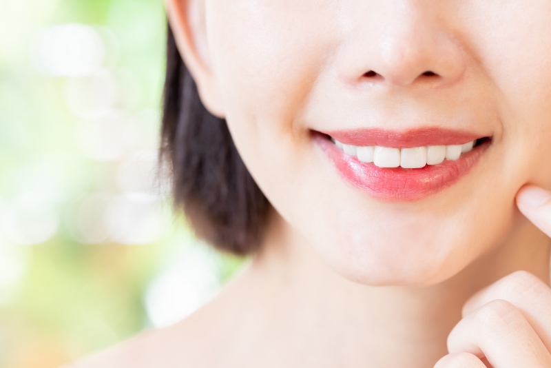 Close-up of a woman after enamel shaping procedure in Wyoming, MI